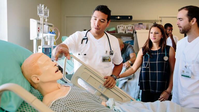 Nursing and health profession students in simulator lab