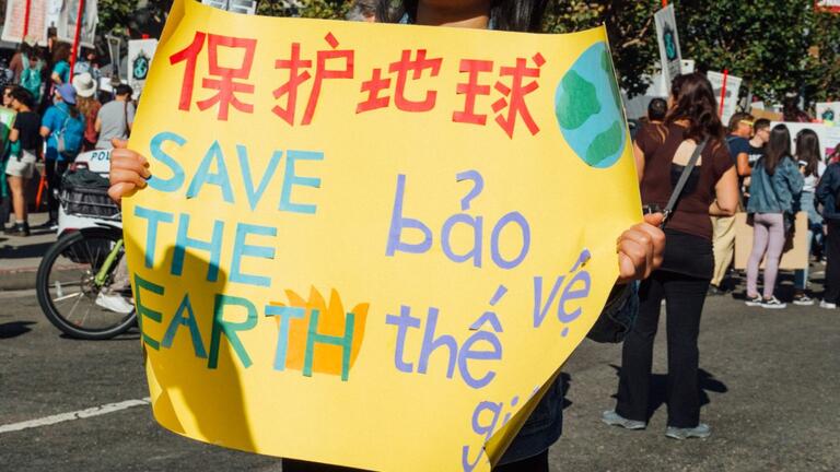 USF student marching in the Global Climate Strike