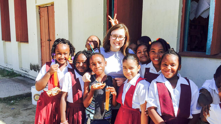 Grace Wakefield ’16, MAT ’17 teaching in Belize, before becoming the student liaison on the state’s teacher credentialing board.