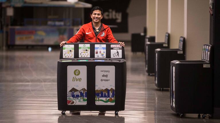 Keoki Kakigi with environmentally friendly bins