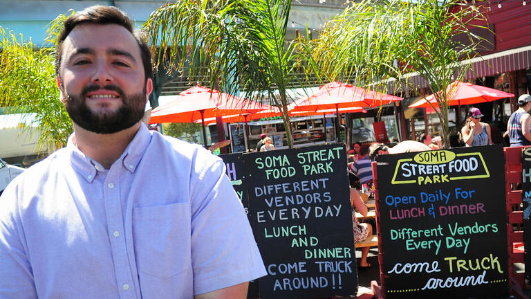 Carlos Muela '09 in front of the SoMa StrEat Food Park