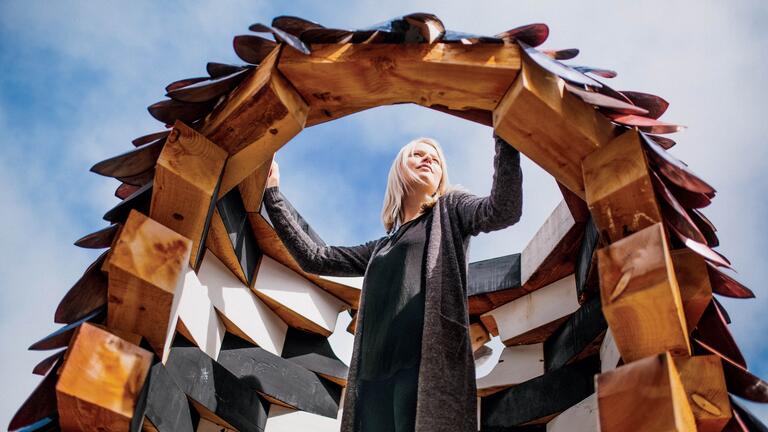 Person posing in art installation