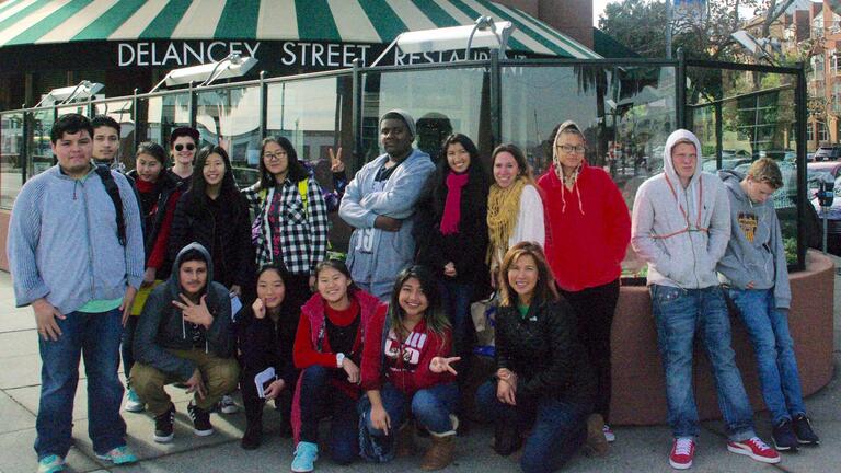 UBMS students enjoy a meal at San Francisco’s Delancey Street Restaurant as part of a field trip to celebrate the holidays. 