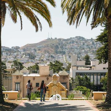 View of city between the palms of Lone Mountain.