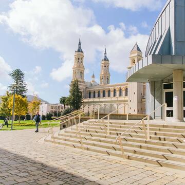 Stairs outside the library with the church in the background.