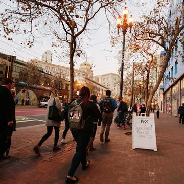 Students walk down Market street.