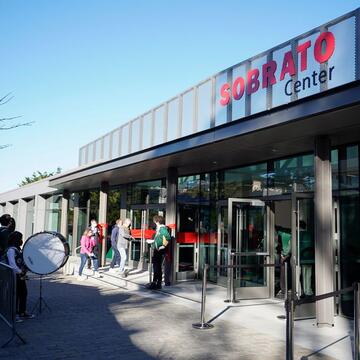 Students stand outside Sobrato Center arena