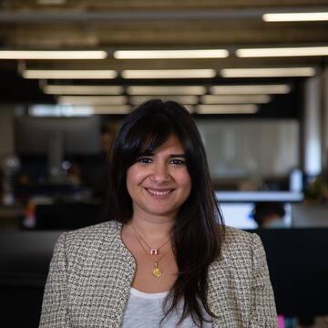 Neha K. Mac standing in picture