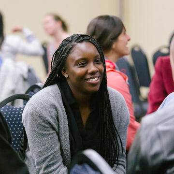 Student in a crowd at an event