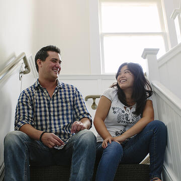 USF law students sitting in stairwell of St. Anne's hall