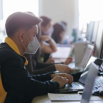 Students work in a computer lab