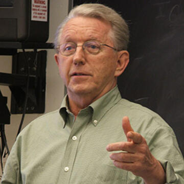 Leo T. McCarthy teaching in a USF classroom