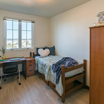 bed and desk in lone mountain east residence hall