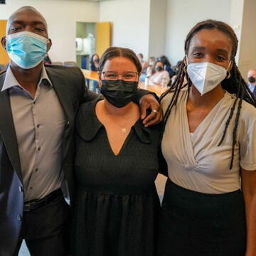 Richard Drzeke '25, Nicole Buchanan MA '23, and Onaedo Okoye '23