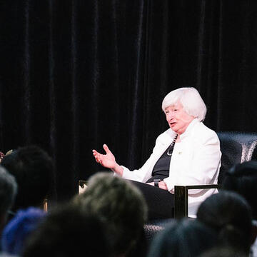 Janet Yellen with another speaker