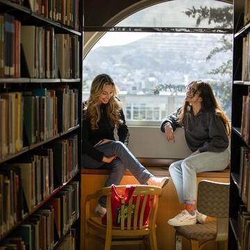 students sitting in the library