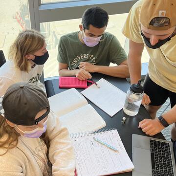 Students working together in a classroom