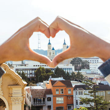 Hands form heart around St. Ignatius Church