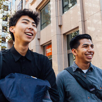 Two students walk the streets downtown.