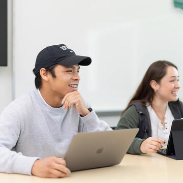 USF student in class listening to the discussion