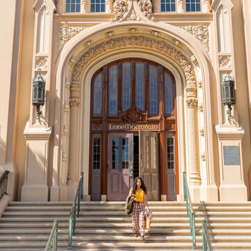 Student walking out of Lone Mountain