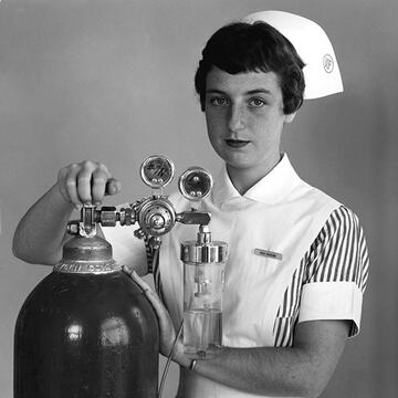 1950s nurse poses for photo