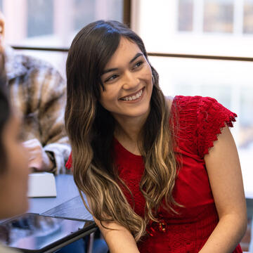 student smiling in classroom