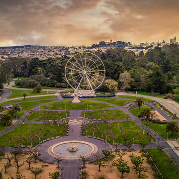 SkyStar ferris wheel in Golden Gate Park, with USF visible behind it