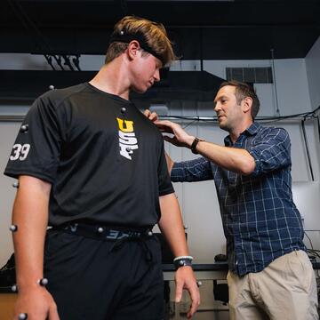 USF student and professor in Motion Analysis Lab