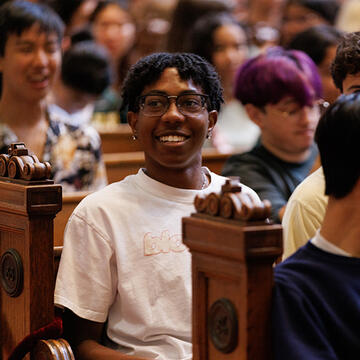 student smiling in church