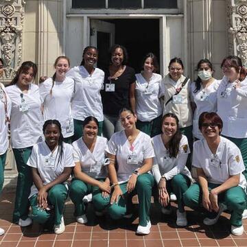 Nursing students smiling.