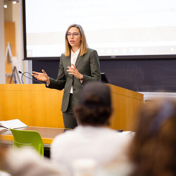 Person speaking to students