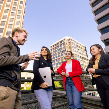 graduate students talking outside