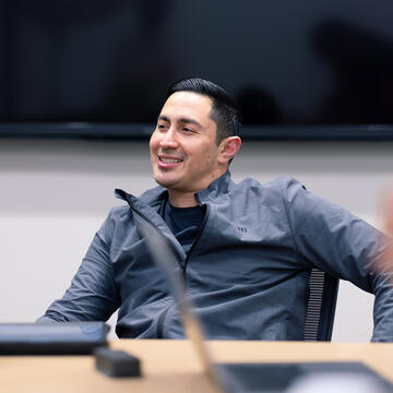 student smiling in class