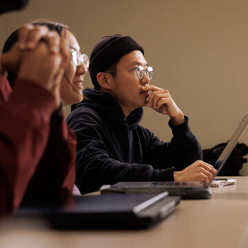 student listens in class