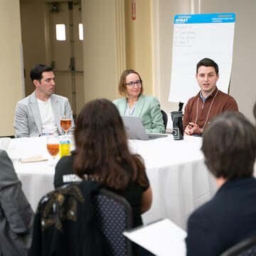 Michele Neitz and others at Social Impact Summit