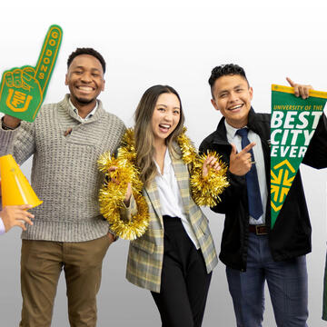 Group of USF staff smiling and posing