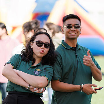 Two USF students working on campus