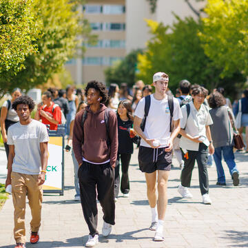Group of students walking on campus