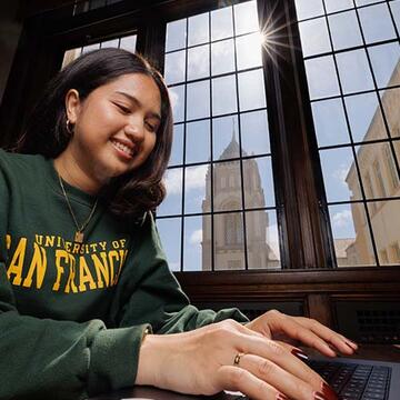 Student working on a laptop