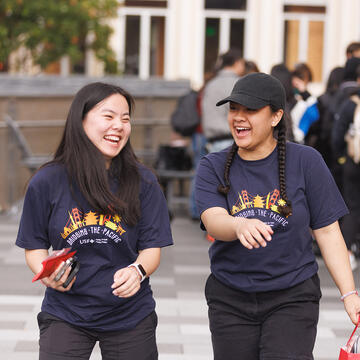 students walk together on campus