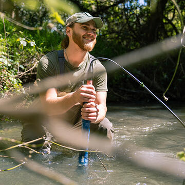 usf student performs experiment in the water