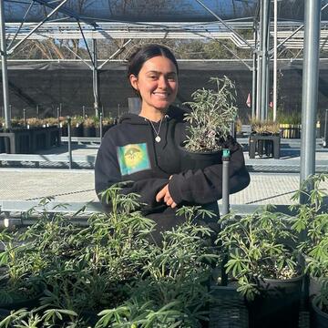Maya Jaramillo-Visconte in a nursery
