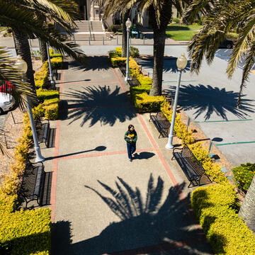 student walking on campus