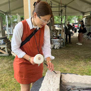 Priscilla Arrighi ’25 at a stone carving workshop