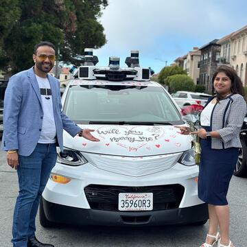 Kesha Shah and her husband, who proposed with a Cruise car