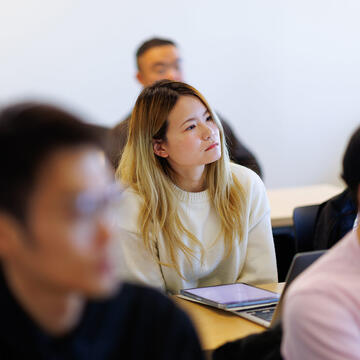 computer science student sits in class