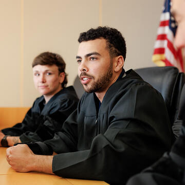 Law student as judge in practice courtroom