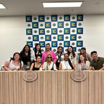 USF students posing at Melbourne Cricket Ground