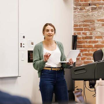 Faculty lecturing in a classroom
